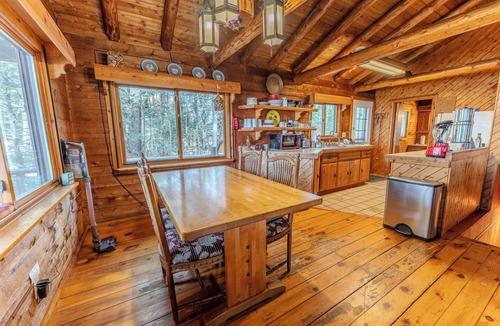 Manistique Cabin | Snug UP: Walk Straight From Porch to Shore This Summer