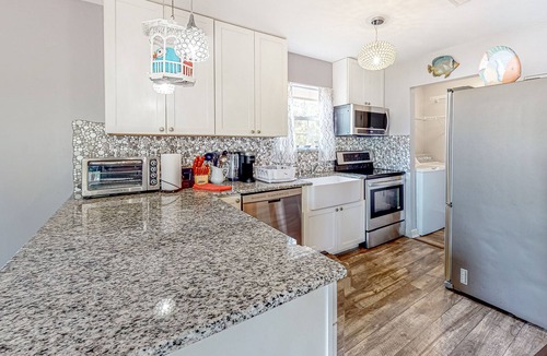 Gulf Breeze House | Soundside Vibes | House in Gulf Breeze with a pool, firepit, and beach access