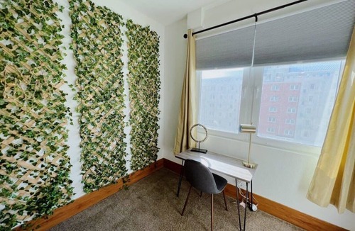 Grandville Apartment | Spacious 6BR 6BA Grand Castle Apartment Near Downtown