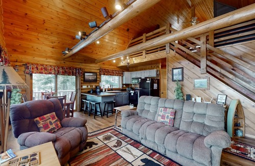 Presque Isle Cabin | Spacious and beautiful lakefront log home on 7 acres with private dock
