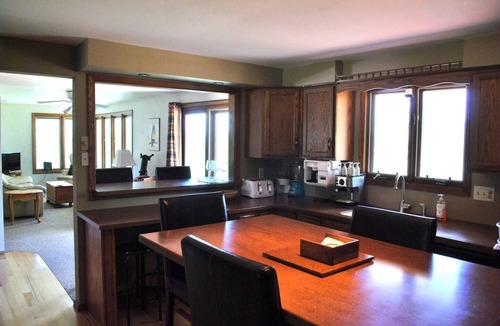 Green Bay House | Spacious "Bayview" 4-bedroom home in serene setting. Minutes to Lambeau Field.