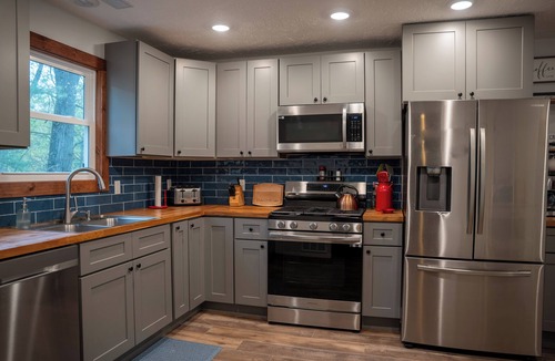 Irons House | Spacious cabin for families & friends, ORV trails, Big Bass Lake access, & more!