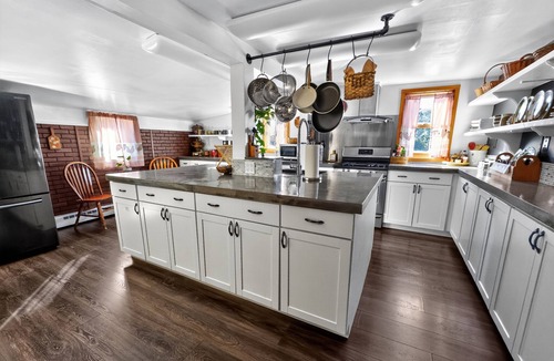 Calumet House | Spacious home with charming lodge feel – In town, one block from trails!