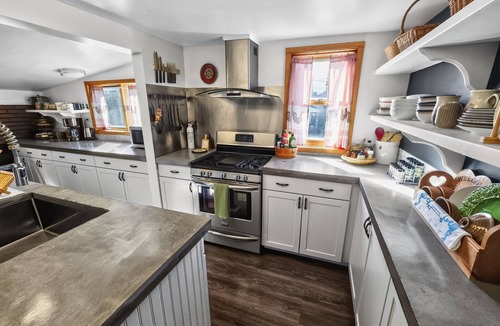 Calumet House | Spacious home with charming lodge feel – In town, one block from trails!