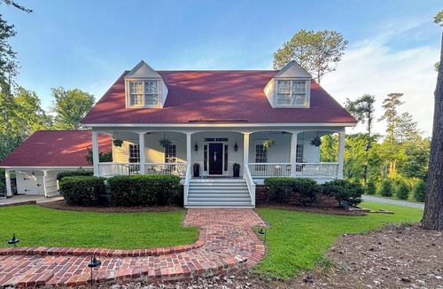 Evans House | Spacious Southern Masters Week Retreat with Pool & Private Wooded Setting