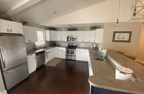 Ferrysburg House | Spring Lake waterfront home on Markers Cove with full Spring Lake access!