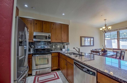 Copper Mountain Village Condo | Steps to Skiing! Modern 2BR Retreat w/Deck, Garage & Fireplace