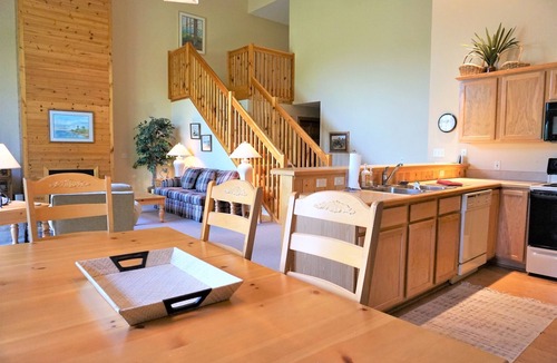 Mancelona Condo | Stunning Knotty Pine Condo at Schuss Mountain