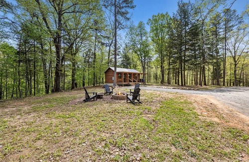 Pickens Cabin | Stunning Riverfront Log Cabin Nestled Amidst Trees in Nashoba, Oklahoma