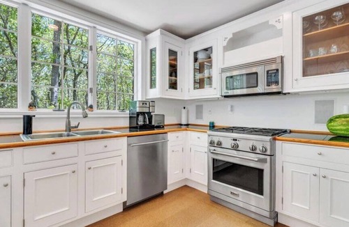 Water Mill House | Stunning shingled Water Mill estate featuring a private heated pool and.