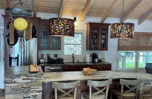 Cullowhee House | Stylish lakefront home with large flat yard, boat dock, hot tub & mountain view!