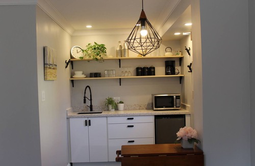 Aurora Apartment | Stylish Main Level Suite with Separate Entrance, Private Patio and 2 Car Parking