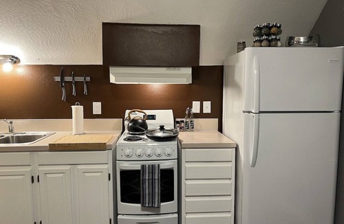 Northeast Neighbors Apartment | Suede- A stylish studio: extended stays, garden