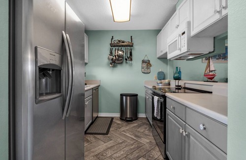 Sugar Beach Condo | ⛱️Sugar Beach C-11-Fenced Yard, Gulf Side, & Pool!⛱️