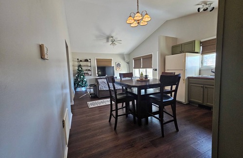 Six Lakes Cottage | Sunset Cottage: Lakefront Escape - Fenced Yard - Pet Friendly - Kayaks - Fishing