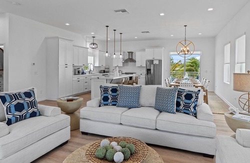 Coury House | Sunshine Getaway in Kcb Luxury Pool Home, 3BR · 3BA · Heated Pool · Bikes · Foosball · Outdoor TV · Pet-Friendly