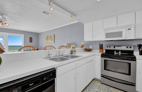 Bel Air Condo | Surf Club Beachfront Condo 2BR, Large Balcony, Quiet East End, Beach Access!