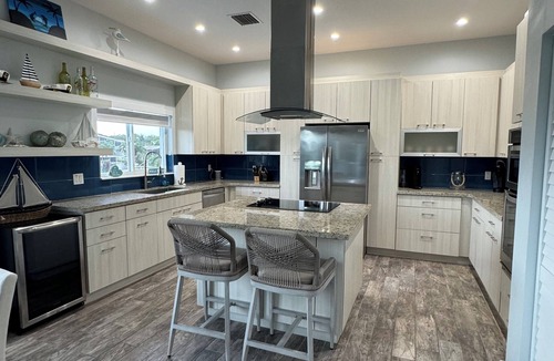 Twin Lakes House | The Key Largo Oasis, a Beautiful Waterfront Home with 60’ Dock and Pool