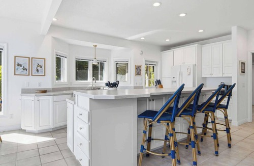 Bellaire House | The Loon at Intermediate | Hot Tub | Waterfront