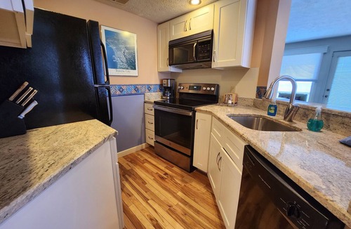 Traverse City Condo | The View from 309! Private Balcony, Corner unit - North Shore Inn Condo 309