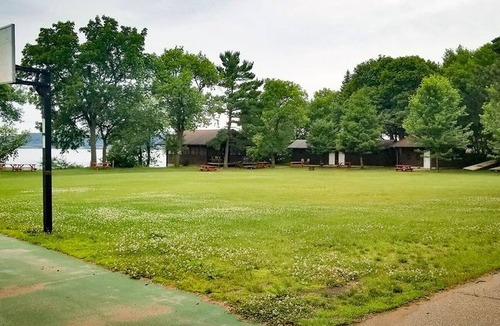 Pepin Cabin | This camper cabin with attached bathroom makes the perfect summer camp retreat!