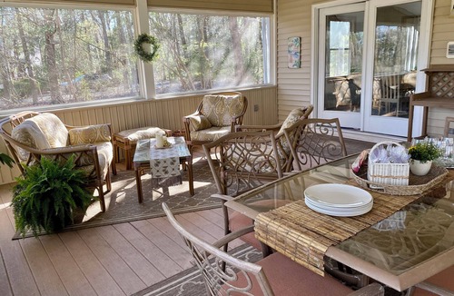 Clermont House | Three bedroom home in beautiful treelined neighborhood.