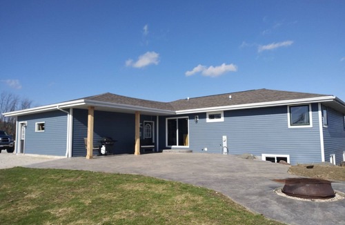 Waldo House | Three bedroom ranch style pet friendly home with a patio & theatre room!