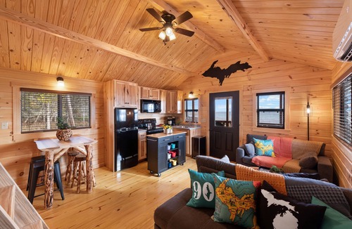 Escanaba Cabin | Tiny Log Cabin on Lake Michigan Shore Full Week Rental