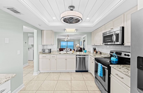 Satellite Beach Condo | TOP END UNIT, OCEANFRONT, 2024 RENOVATED, BARN DOOR Master shower, GORGEOUS
