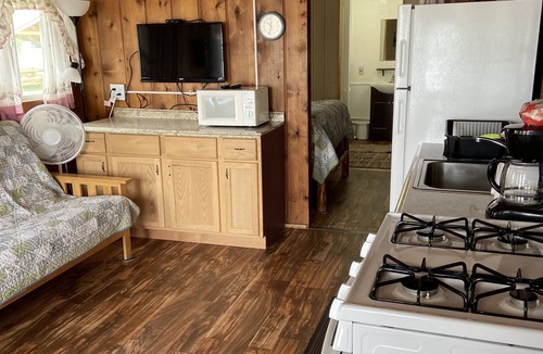 West Branch Cabin | Tranquil Cabin Retreat: Stunning Lake Views and Abundant Recreation