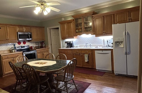 Suwanee House | Tranquility Hideaway in the Woods, King Beds, Pets Allowed, Handicap Accessible
