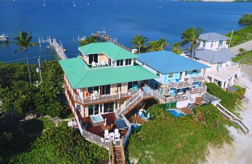 Stuart House | Twice As Nice: 2 SideBySide Ocean-2-River Beach Houses: Docks, Pools, Hot Tubs