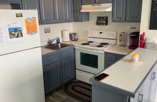 Manitou Beach-Devils Lake Cottage | Two Bed Rooms with a sunrise lakefront view