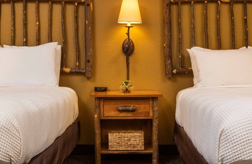 Rothschild Hotel | Two Queen Fireplace Suite With Access to Pool, Hot Tub, and Gym