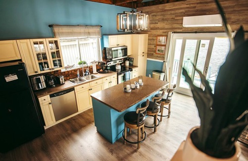Seaford Boat Rental | Unique Cozy A-Frame Houseboat Close to Jones Beach for an Unforgettable Coastal Getaway in Seaford, New York