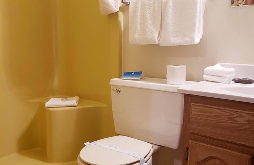 Ironwood Cabin | Unique, Private guestroom inside the Lodge at North Ironwood Acres resort with TWO QUEEN beds and two small bathrooms. DOG FRIENDLY!