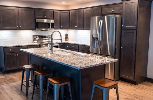 Manitowoc House | 𝗨𝗻𝗶𝗾𝘂𝗲 𝗦𝘁𝗮𝘆 at the Carriage Haus