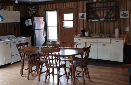 Gleason Cabin | Unplug from it all at a lovely 2-bedroom cabin nestled in the woods!