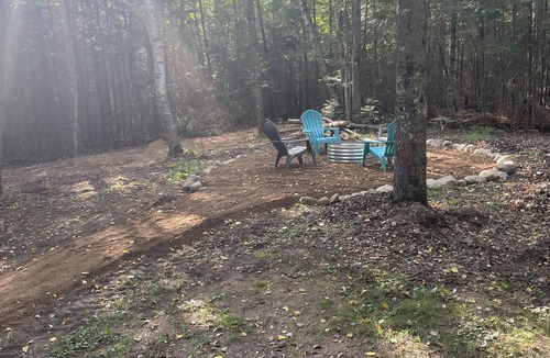 Tomahawk Cabin | Updated Private wooded cottage on the River with hot tub & sauna & pool table!