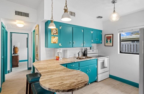 Cocoa Beach Apartment | Uptown Cottage - Walk to the Beach and Restaurants
