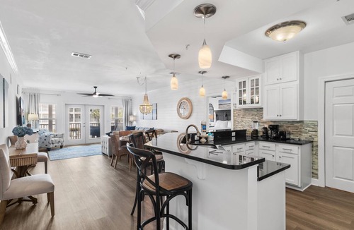 Avalon Beach Estates Condo | Walk to Beach⛱️ Pool + Wrap Around Balcony | Pavilion Palms 103B☀️