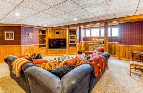 Three Lakes House | Waterfront elegance with private beach & hot tub - dogs welcome