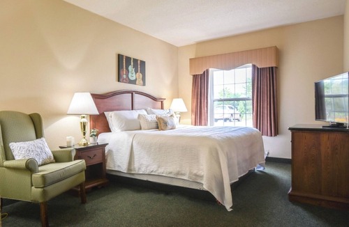 Pembine Hotel | Waterfront Escape | Scenic River Views, Pool, Gym & Onsite Dining! Pets Welcome!