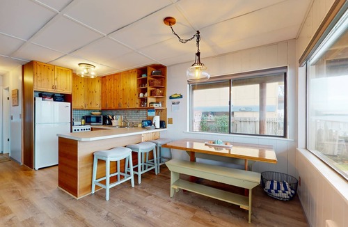 Langley House | Waterfront home with views, deck and open concept living