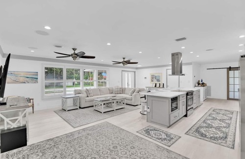 Lighthouse Point House | Waterfront Oasis with Pool, Hot Tub, & Games