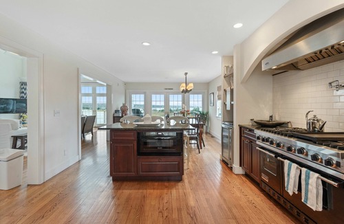 Bay Point House | Waterfront on the Bay! A beautiful 5 bedroom home with dock and walk to Beach.