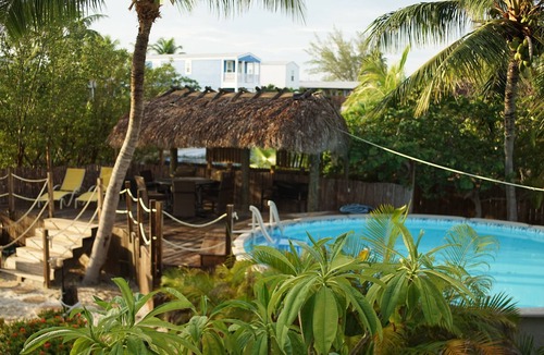 Bay Point House | Waterfront Pool Oasis: Tiki Hut, Kayaks & Family Fun!