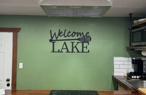 Longtown Apartment | Waterfront Studio with Hot Tub & Fire Pit Sleeps 4