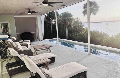 Merritt Island House | Waterfront Sunset View Home W/Pool. King bed
