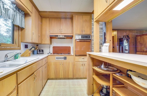 Central Lake Cottage | Waterfront Torch Lake Cottage w/Dock & Fire Pit!